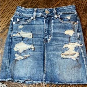 Blue ripped jean skirt